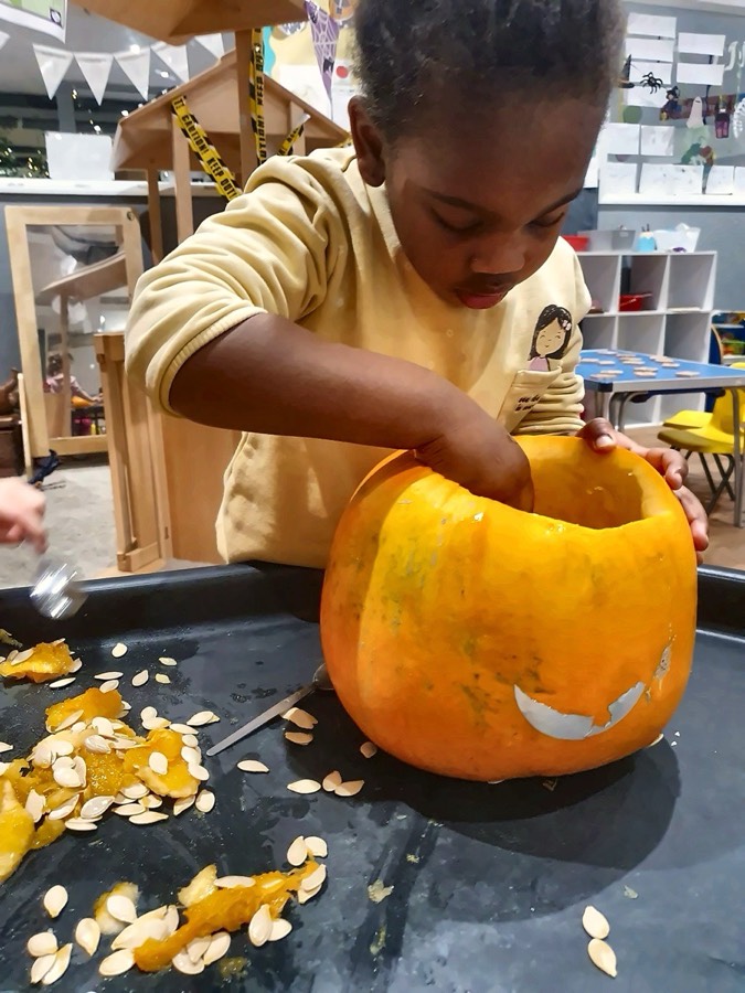 Nursery child engaged in play at Handprints